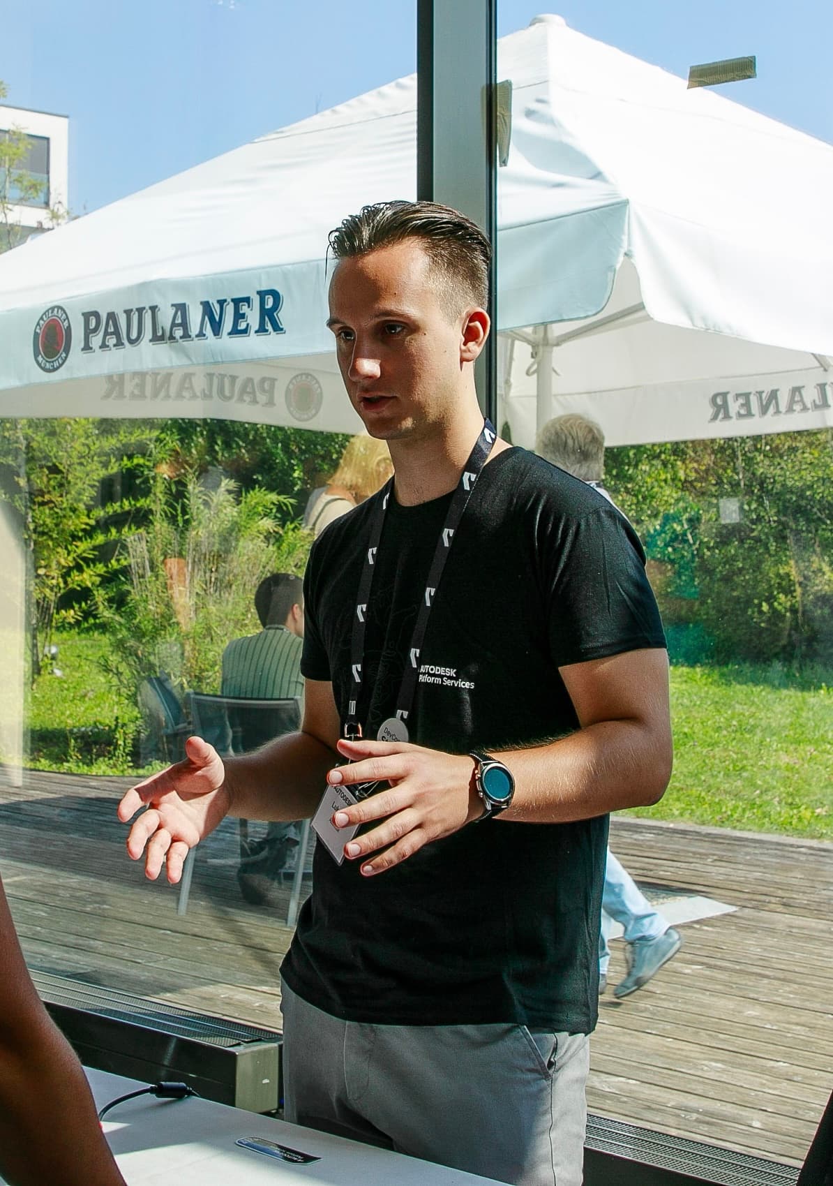Luka Kralj presenting his work at a conference